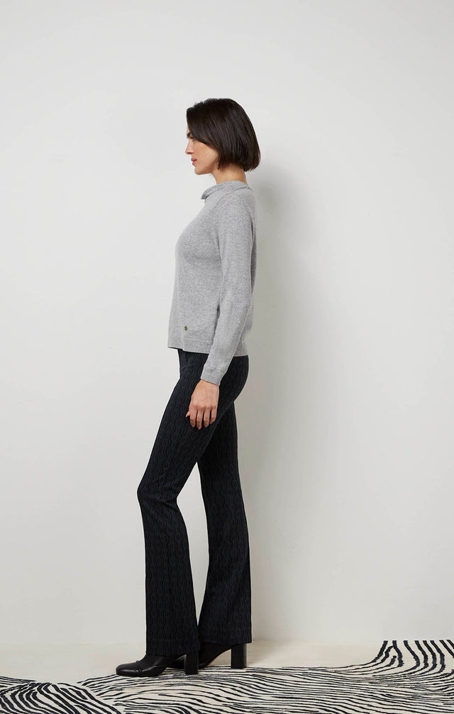 Ecom image of a model wearing Melodic sweater.