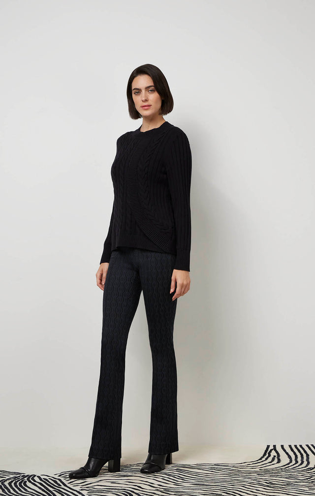 Ecom image of a model wearing Paramount sweater.